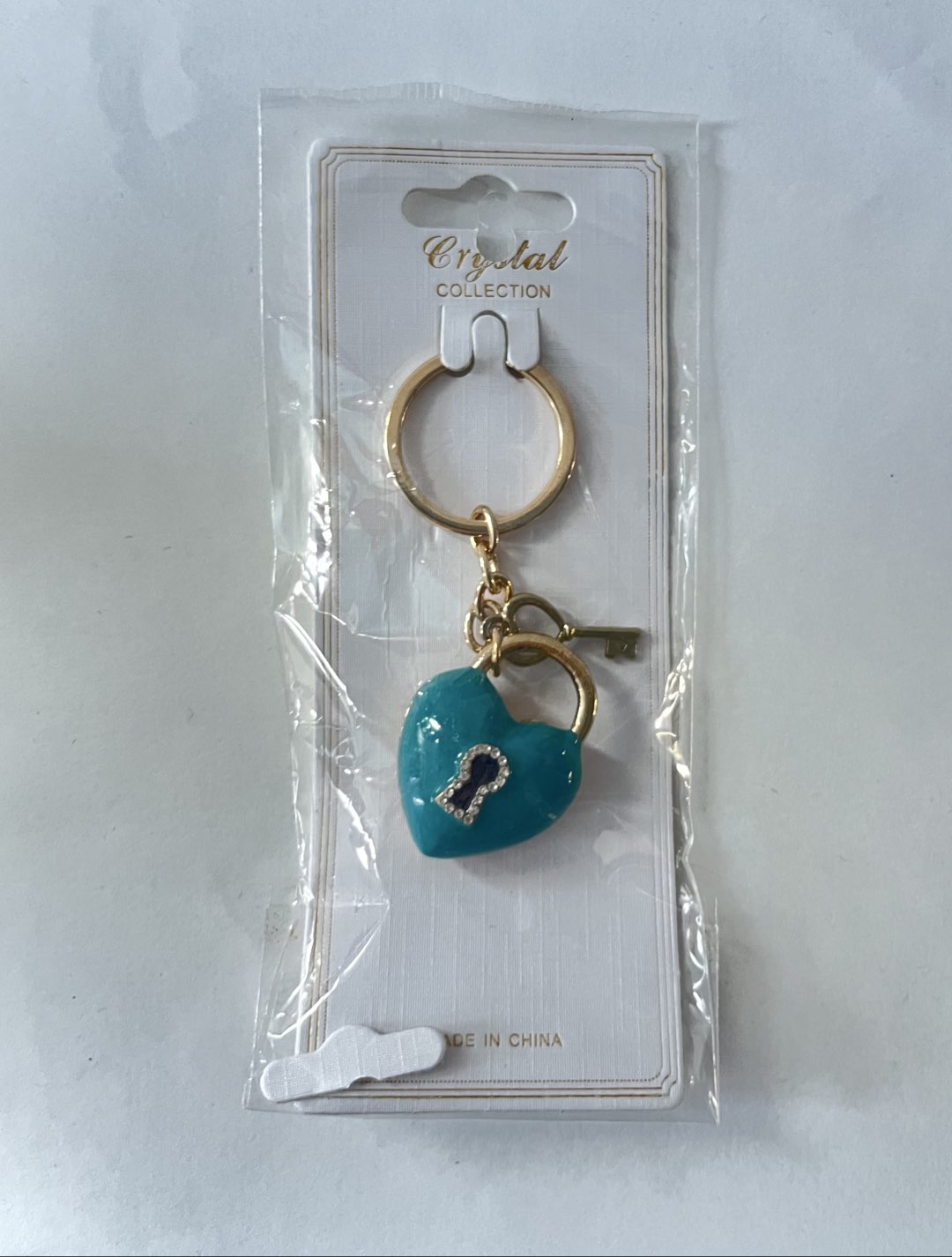Blue heart locket keychain